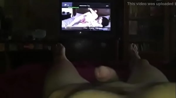 a handjob watching porn