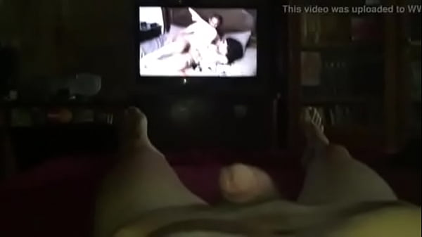 a handjob watching porn