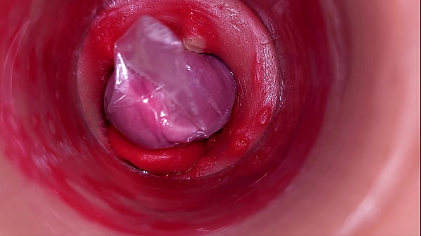 Download Video - The camera inside the deep pussy records a huge ejaculation with a stuck condom