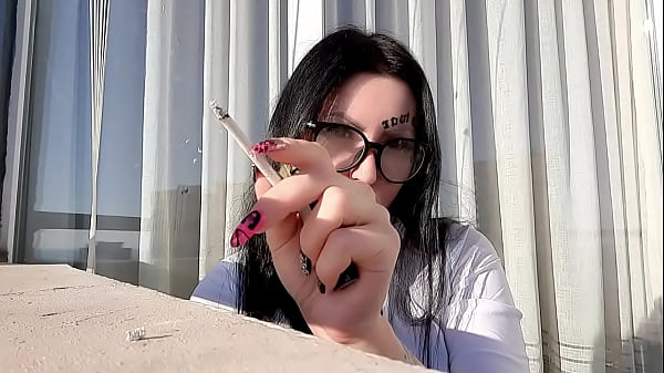 Smoking fetish. Dominatrix Nika smokes cigarettes sexually, blows smoke in your face and flicks cigarette ashes. Sexy smoking, sexy smoker, cigarette smoke.