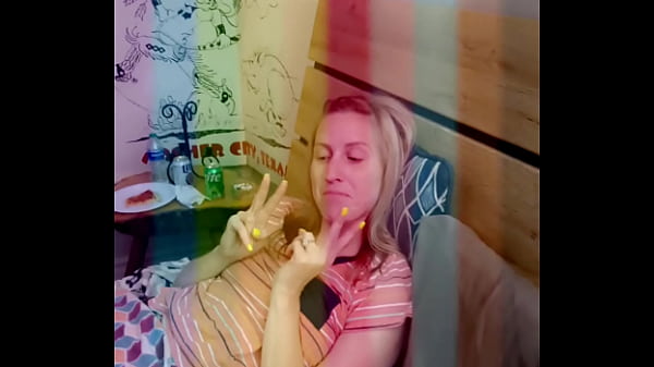 Danielle Roy playing the drums with her toys