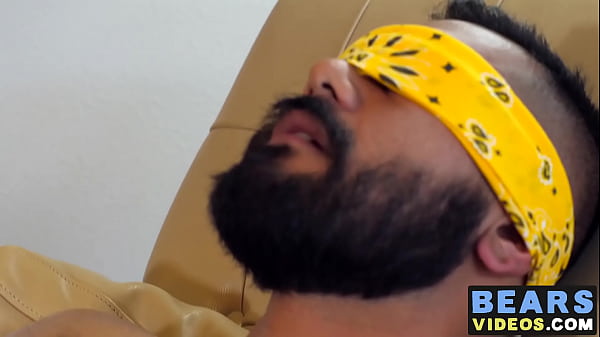 Hairy bear strokes his cock thinking about bein...