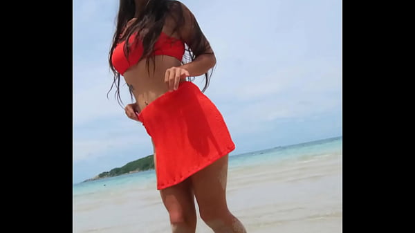 Orange sexy bikini fun on the tropical beach