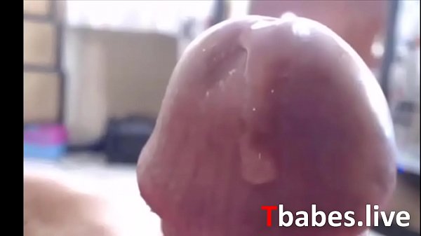 Beautiful blonde shemale plays with her big coc...