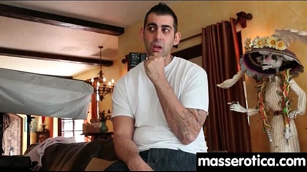 Massage therapist giving her patient some unkno...