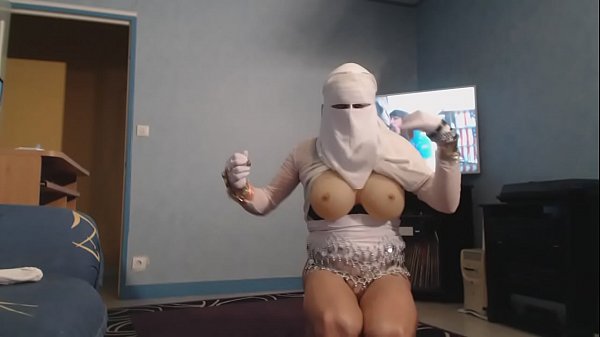 Big boobs of arabic female in burqa