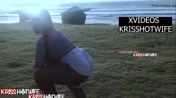 Kriss Hotwife Taking a Walk Along the Beach in Sheer T-shirt