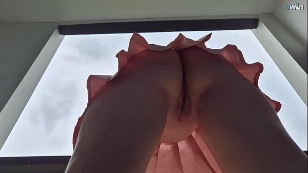 Upskirt view on the pussy without panties. Hidden camera in the mall. No panties