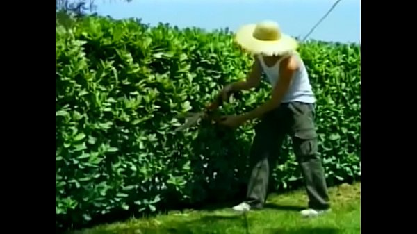 Download Video - Open-handed gardener is not against to share his hard tool with his assistant