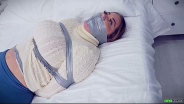 Brunette girl next door with huge boobs hogtied bound gagged with tape and totally helpless in her tight bondage BDSM pantyhose encasement EP 3