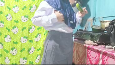 Sister-in-law comes home from school masturbating in the kitchen using a cucumber