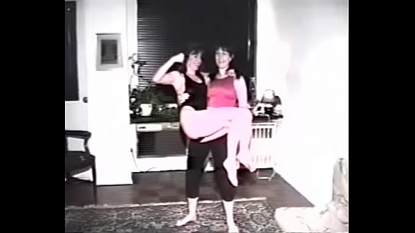Robin & Cindy lift each other - 3