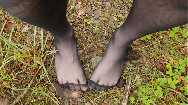 Outdoors walking the forest trail in just panty...
