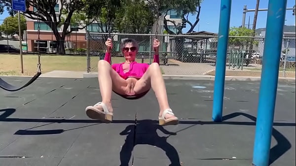 Playing on a swing in Kaimuki. (BTW, this is NO...