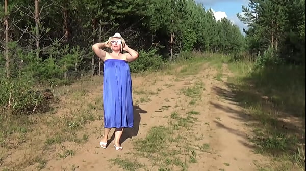 Naked milf under light summer dress