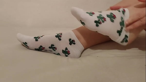 Girl taking off her socks