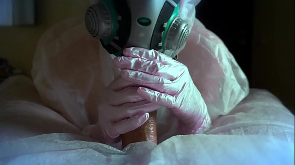 A girl in a protective suit and a gas mask sucks a dick. Sex during the COVID 19 epidemic