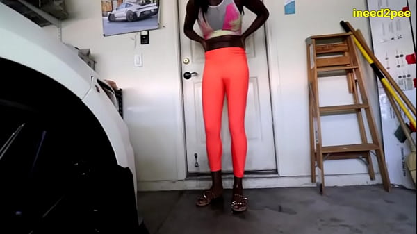 Paris Luv wetting yoga pants in garage
