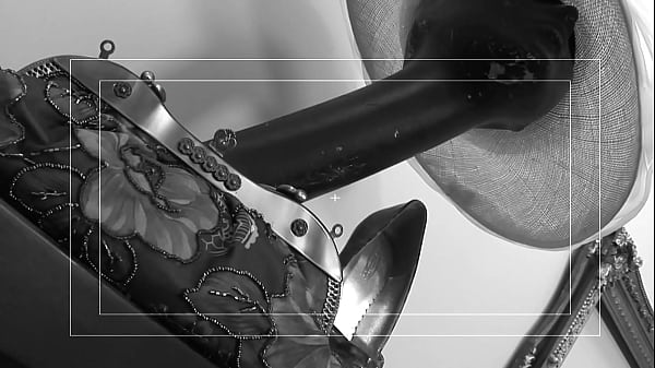 Reaching for a dildo, Caylian reaches climax, drenching her toy, and the hotel room's...