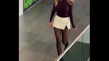 Sexy Sophia in pantyhose and a short skirt with sexy split.