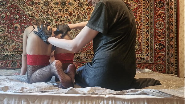 Man opens a girl's anal hole