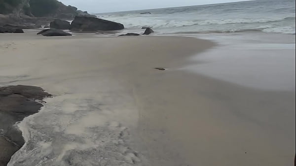 Hot amateur video giving to two young guys on the nudist beach