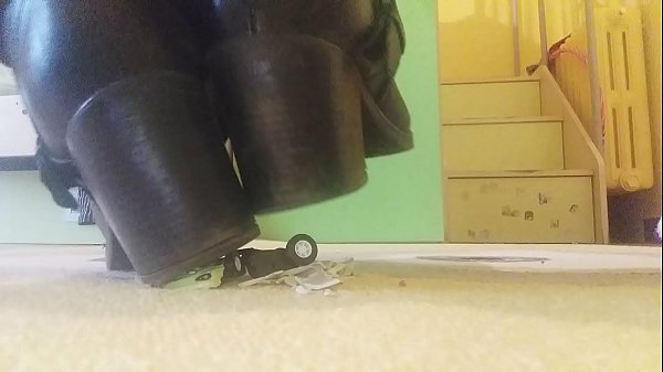 gorgeous but evil giantess, destroy your toy cars under her big boots