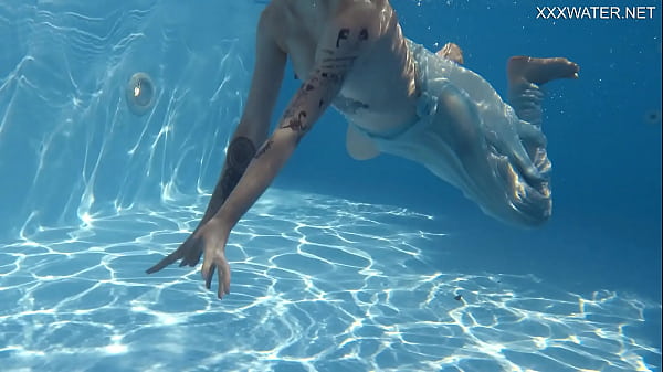 Mimi Cica yet again shows how sexy she can swim