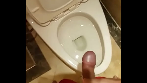 Rolling up his hard-headed dick to piss