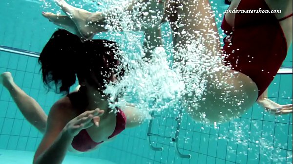 Two sexy lesbians in the pool
