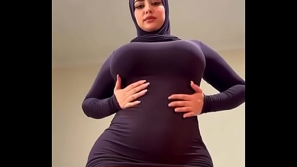 A beautiful hijab-wearing girl is dancing