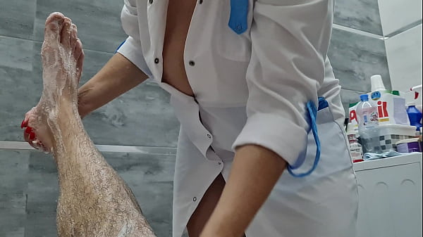 Nurse Gives Handjob In The Bathroom