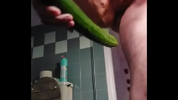 Granny fucks hairy pussy with cucumber