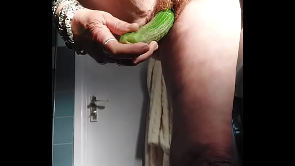 Grandma fucks pussy with cucumber