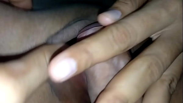 Rubbing the cock on the Thai nurse's clit until her pussy is wet.