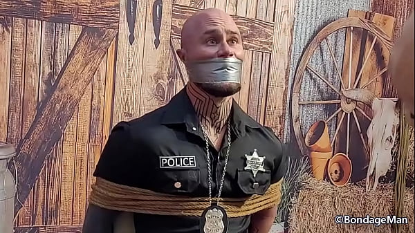 Henrique Becker police officer tied up and gagg...