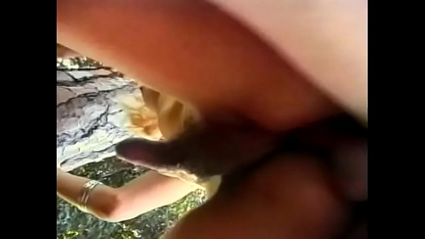 Download Video - Young blonde transvestite is fucked in the ass under a tree