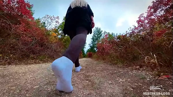 Follow my footsteps along the path in the evening lonely forest