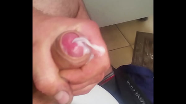 Guy cumming in public toilet