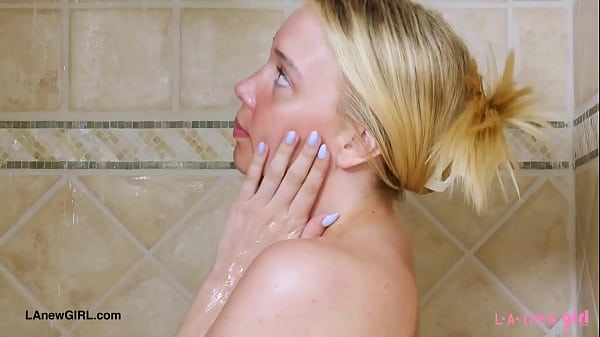 Golden-haired stunner took a shower