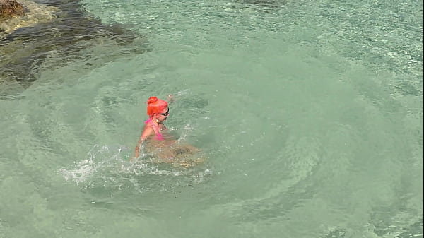 Pink bikini in a beautiful bay 2 min