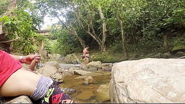 Unknown woman gives me a handjob in a river, fills her breasts with milk