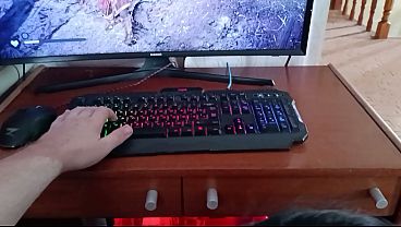 Stepmom sucks her nerdy stepson while he's playing on the computer