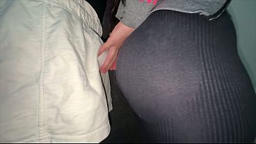 Big-assed girl grabs a stranger's cock in the store.