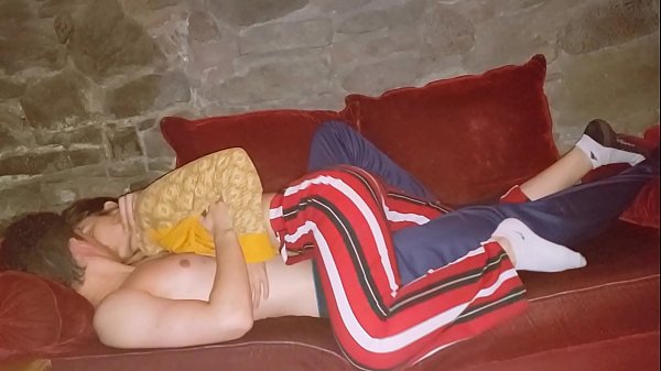 Making love secretly on the couch in the baseme...