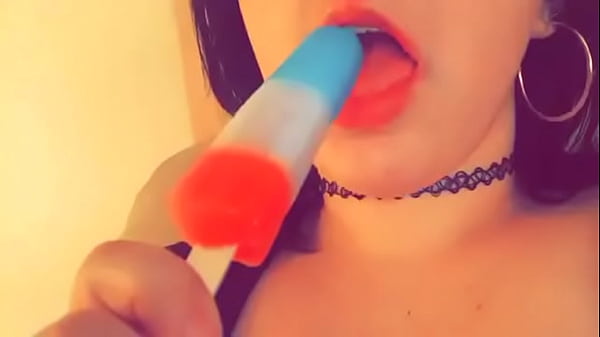 Sucking on a popsicle