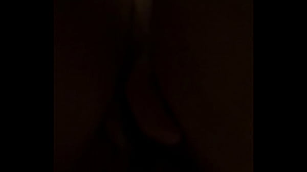 Sexy Latina with a shaved pussy and a dildo in her ass and one in her pussy