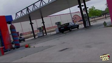 Big tits redhead gets seduced at a parking lot and deepthroats his massive cock.