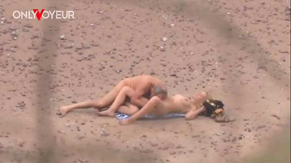 Download Video - Beach Voyeur&period; Older guy fucking hot MILF on the ocean shore