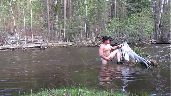 Naked bathing in the river.